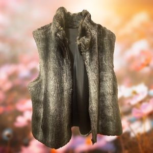 Woman’s large reversible faux fur vest, by Blassport
